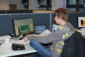 Jesse Venbrux (playing Spider Solitaire!) at YoYo Games